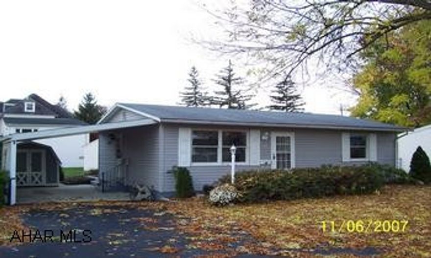 The curb appeal is very inviting and the interior is even better. Remodeling has just been completed and there is nothing to do except move in and enjoy this home. This rancher has a new heating and cooling system, new oak kitchen, new vinyl siding, all new flooring throughout and freshly painted interior all on a picturesque lot on a quiet street in the borough of Hollidaysburg.
