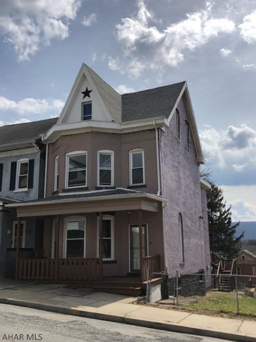 This large and spacious 3 bedroom brick house is sitting on a fenced double lot.  Entertain family and friends on the covered deck or relax in the evenings on the front covered porch.  This home features a newer roof and newer flooring in bathrooms.  There is plenty of living space on the first floor and which also has a half bath and laundry room.   Move in condition!  Call today before it is gone!