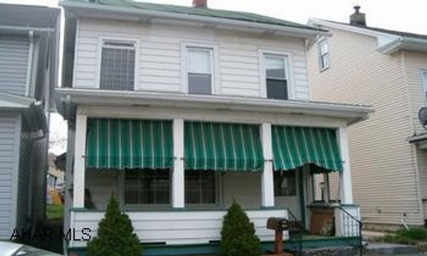 2 1/2 story home needs a little TLC, nice neighborhood. "AS IS" 2 1/2 story home "AS IS" Needs a little TLC.