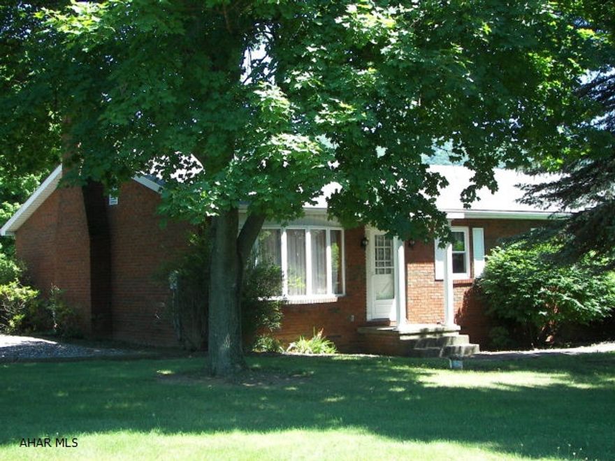 GREAT,GREAT COUNTRY PROPERTY! Large 5 bedroom, 1.75 bath brick ranch home with 2+ acres. Stone fireplace in living room. Geo-thermal heat w/electric & oil backup. A full basement with painted concrete floor, laundry hook-up and a generator outlet. This property also has a large concrete block shop building 42x37 with a grease pit, half bath & 2 large sliding doors. It also has 3 pole buildings with 5 large doors. Gorgeous setting! Enjoy the beautiful view of the valley & mountains!!! Also the property is located near Clover Creek Trout Stream. Property was subdivided and taxes are TBA.