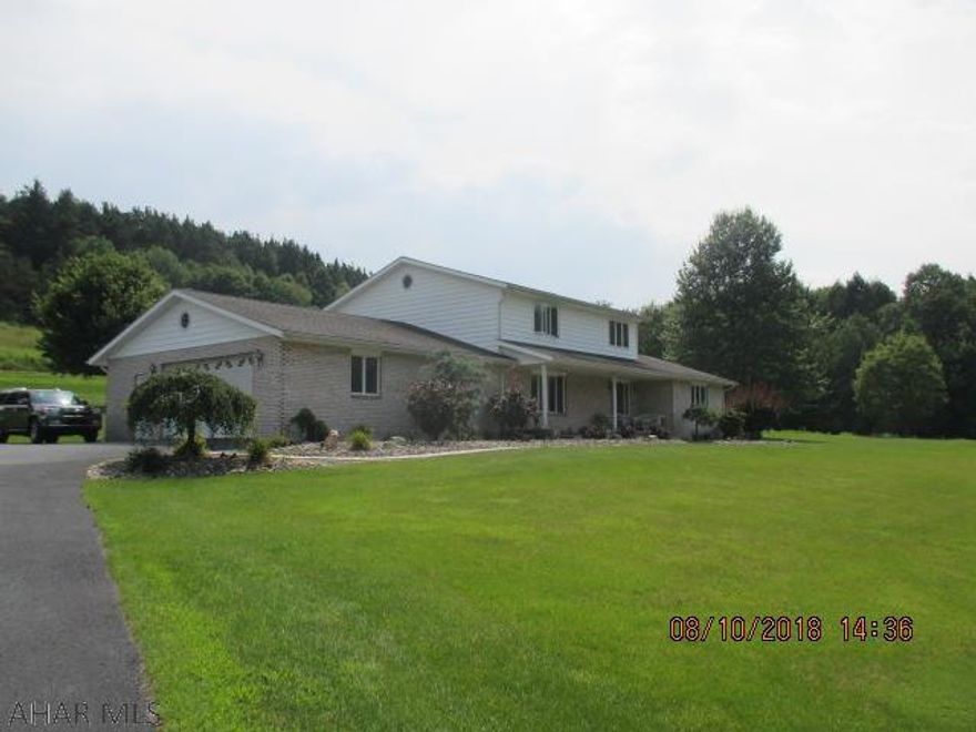 Beautiful and private country setting on 4.2 acres boasting a pond and heated in ground pool.  Must see this immaculately maintained and upkept property located at the very end of a private road. This home has a completely tiled 3/4 bath with a walk in shower and glass wall on the first floor,a regal den/office with a stone fireplace, and beautiful plaster walls and ceilings.  Kitchen stove is propane but can easily be converted to electric and home has a whole house fan for cooling.Too many features to list so call to schedule your showing or further details.