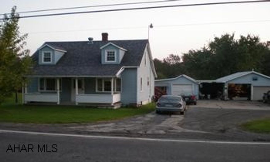 Nice 1 1/2 story, 2-BR home on 2 acres.