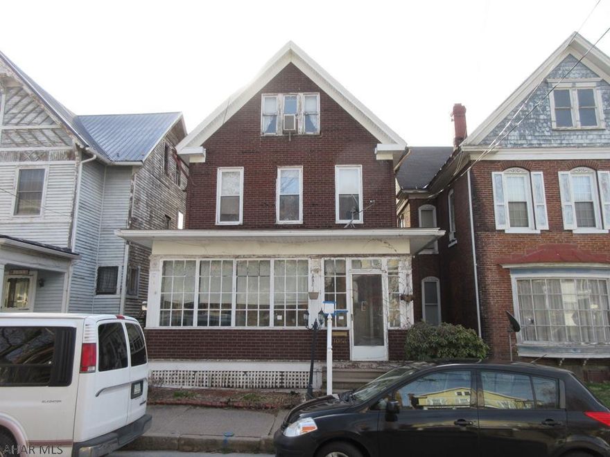 Tyrone 2 unit apartment building. Needs work, but loads of potential. Property sold AS-IS. Seller will make no repairs.