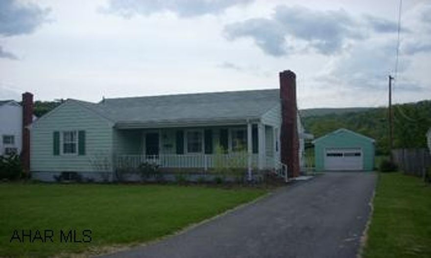 Well maintained 2 bedroom home on level lot. New windows, new roof, hardwood floors throughout. 1 car detached garage.