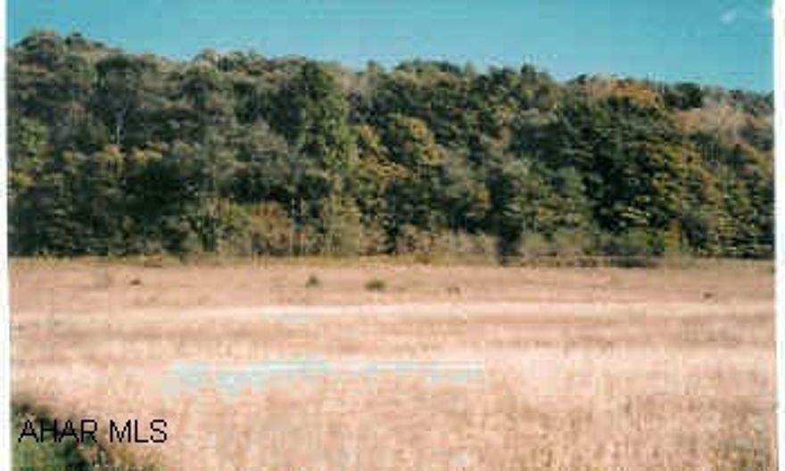 3.67 Acres, great views Perk approved, septic system plans available.