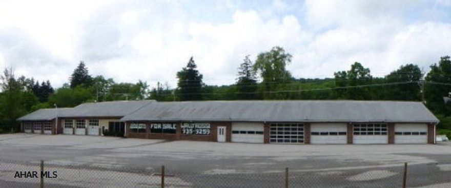 Exceptional business opportunity!  11 bay garage with retail space, showrooms, offices, service areas and more!  Newly paved parking lot, newer shingled roof.  Available for immediate occupancy!  Centrally located between State College, Altoona and Huntingdon in the I-99 business corridor!