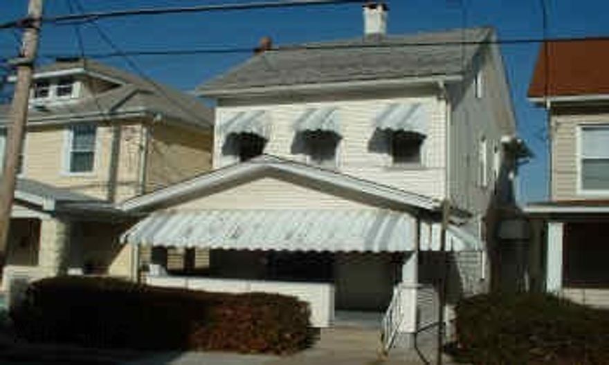 NICE TWO STORY WITH DETACHED GARAGE.  WORTH A LOOK.  SOLD AS IS.
