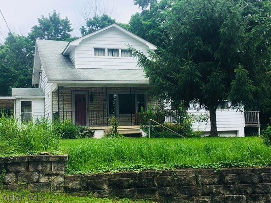 2 bedroom, 1 bath home on 0.838 acres. Newer kitchen, updated electric, oil and wood furnace, integral garage, carport, large living room with fireplace and sunroom. Property on 3 parcels. One parcel is currently rented as a trailer space for $150/month. Great starter home, investment or forever home at a great price!