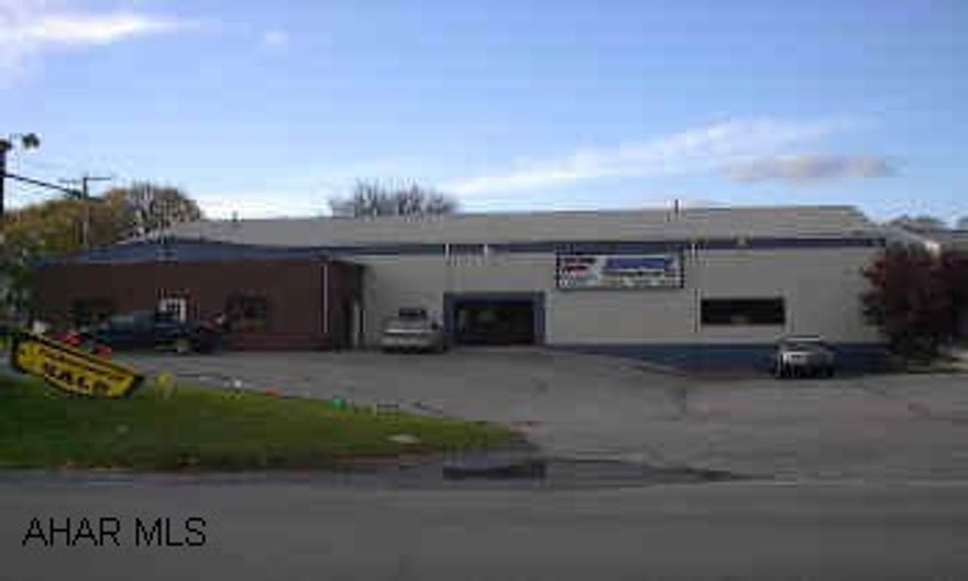 Nice sized commercial building approximately 5,500+/- total sq.ft. also with 2nd floor storage.  Former video store with 2nd floor balcony and offices.  Former pizza shop also.  Owner will also consider leasing the building. Commission on lease will be paid as 45% of first months rent to cooperating broker.