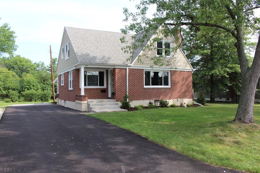 Totally remodeled Cape Cod style home walking distance from the Hollidaysburg Senior and Junior High.  The home features 4 bedrooms, one of which is a 1st floor master, and 1.5 baths. The kitchen and bathrooms have been completely renovated.  The brand new kitchen has all new stainless steel appliances, quartz countertops, tile backsplash, and ceramic tile flooring.  This home has been professionally painted inside and out.  All the original hardwood floors have been preserved and refinished.  Along with a new driveway, beautiful landscaping, and new concrete work this home is move in ready! Other renovations include new plumbing, updated lateral sewer line, updated electrical service and breaker box, a new roof in 2018, and all new windows! Seller is a licensed real estate agent.