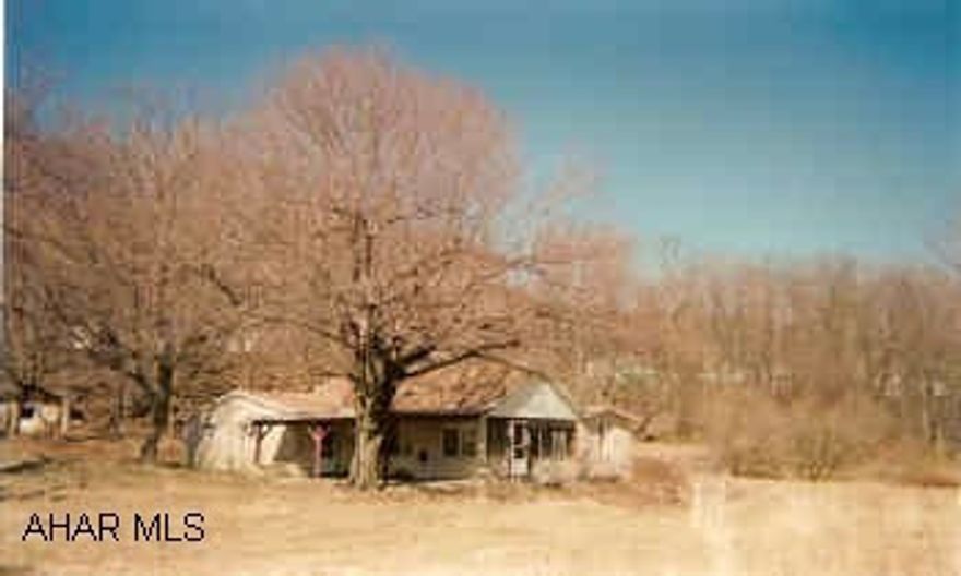 Ranch home with acreage Needs Work
