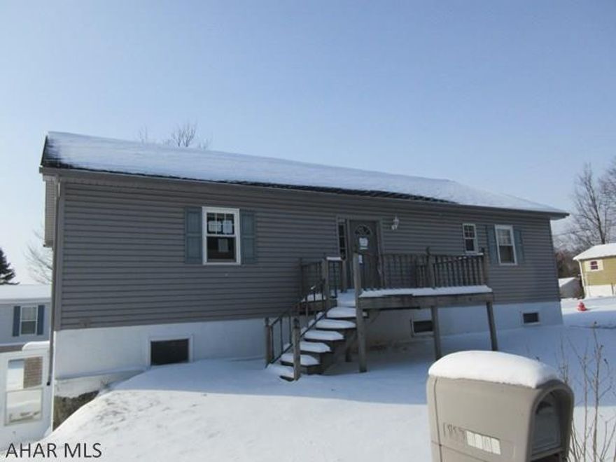 Nice area in Cresson, but home needs major TLC. 1 story home with vinyl exterior and deck, but a complete redo inside. No functional heating, plumbing, electrical, etc. Make it your own! AS-IS sale. Seller will make no repairs