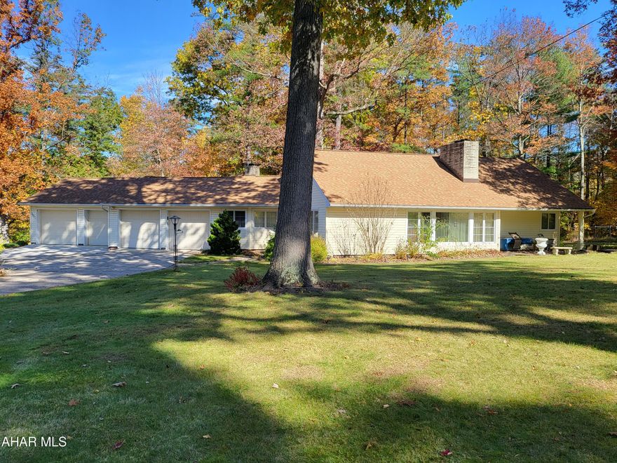 Antis Township Bellemeade area!  Just shy of an acre with a 4 car garage, this property features a 1.5 story home that is ready to move in!  Hardwood floors throughout the first floor under the carpet. 2 bedrooms and 1 1/2 baths on the main floor with a Whirlpool tub. Second floor has an abundance of storage and bedroom.  Convenient first floor laundry with sink  All appliances are included in the large kitchen featuring pull outs.  Open dining area with patio and large living room.  Gas fireplace with slate hearth. Updated heat pump with central air, newer roof.  Above the garage is storage area!