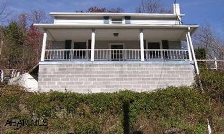 2-Story Frame/vinyl house, 2BR/1BA on large 3 acre lot with mountain view. Offered for sale in "As-Is" condition. Very nice up- dated kitchen, all replacement windows, newer oil FA furnace and water heater, 200 amp service. Great starter home.