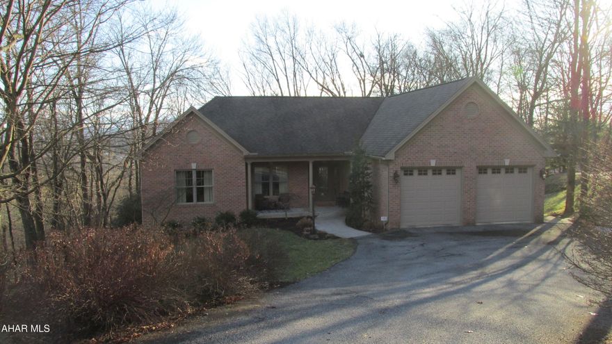 Pristine ranch in a peaceful, private setting (Las Villas). This home has it all!! Lovely covered porch entry, open foyer, Dining Room, Living Room, Kitchen with SS appliances & granite counters, hardwood floor. Awesome owner's suite with Maxx shower, heated tile floor, built-in safe, ceiling fans in all bedrooms. Large finished lower level with kitchenette, 2 Bedrooms, Full Bath - 5 Bedroom total - 3 Bath Total! Enclosed porch, large storage area. Trex deck - fabulous view - don't wait!