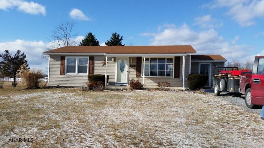 Ranch home with additio. Oak kitchen with lots of counter space.