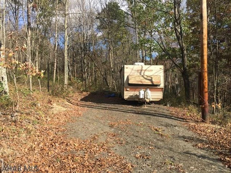 This property would make a great location for a full time residence or weekend getaway. Located minutes away from Shawnee Lake and PA State Game Lands. Mobile Trailer on property can stay or be removed. Has road frontage and electric on site.