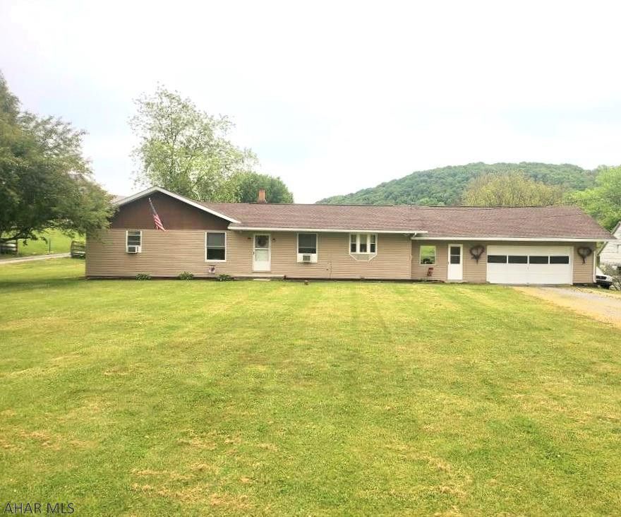 Looking for a new place to call home? Just outside of town you will find this 1 story ranch style home that offers 3 bedrooms, 1 bath, a galley kitchen with freshly painted cabinets and new kitchen flooring.  Enjoy a large open living room for entertaining family and friends or sit outside on your covered porch and enjoy your morning or evening beverage.  After a long day kick up those feet  and relax at your new home sweet home.  Enjoy being outside of town but conveniently located a close distance to restaurants, I99 and the PA Turnpike.