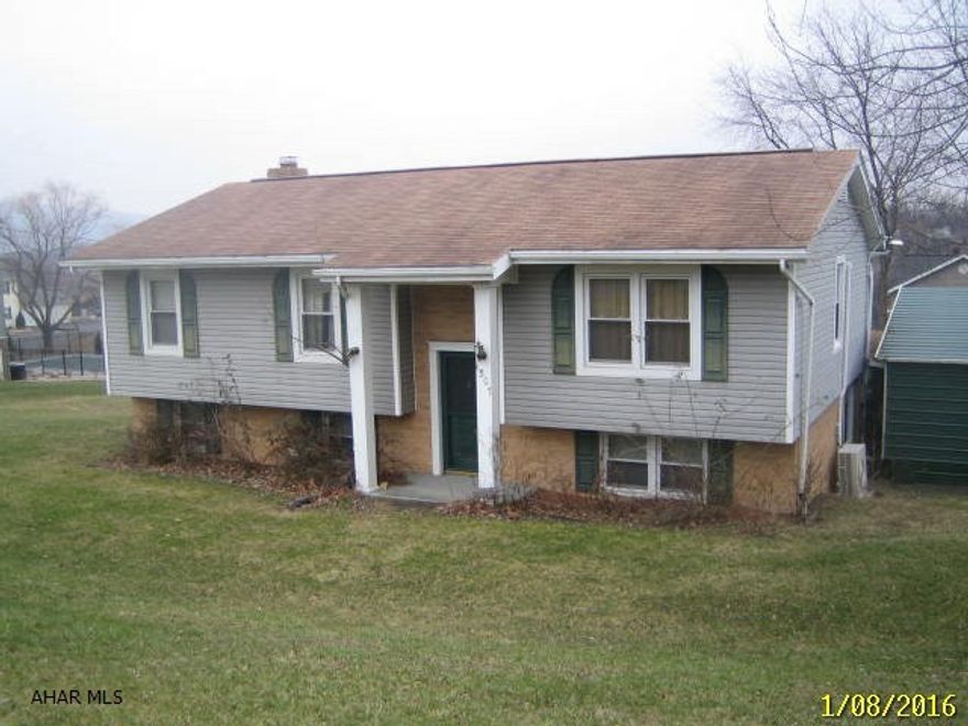 Juniata area brick and vinyl Bi-Level on large lot. Large living room, nicer kitchen with eating area, dining area and beautiful sunroom. Finished basement with bar and fireplace plus laundry area and utility/mud rooms. Enclosed rear porch area and deck, large carport and shed. Needs a little TLC, but could be nice with some work. AS-IS sale.