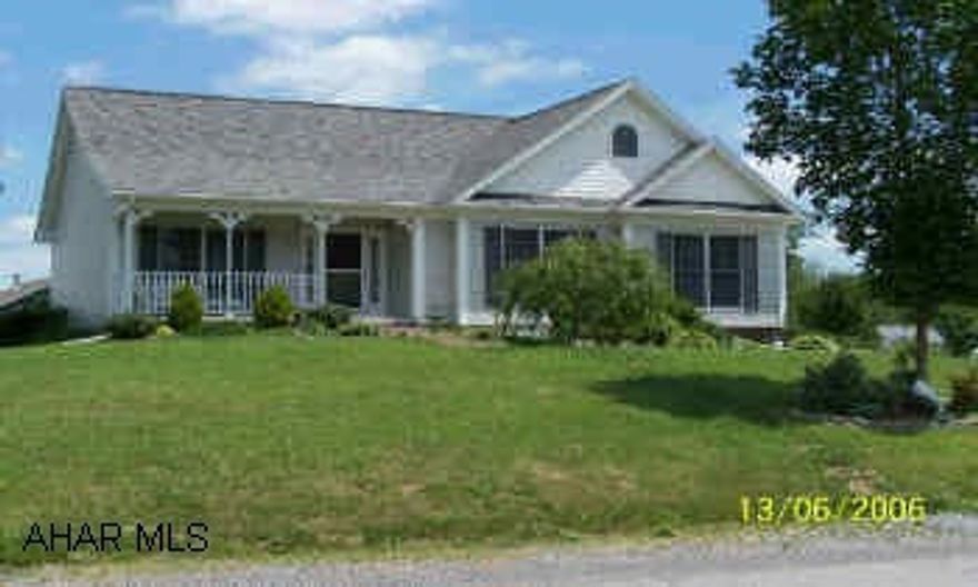 Raised Ranch with additional 3 car garage.