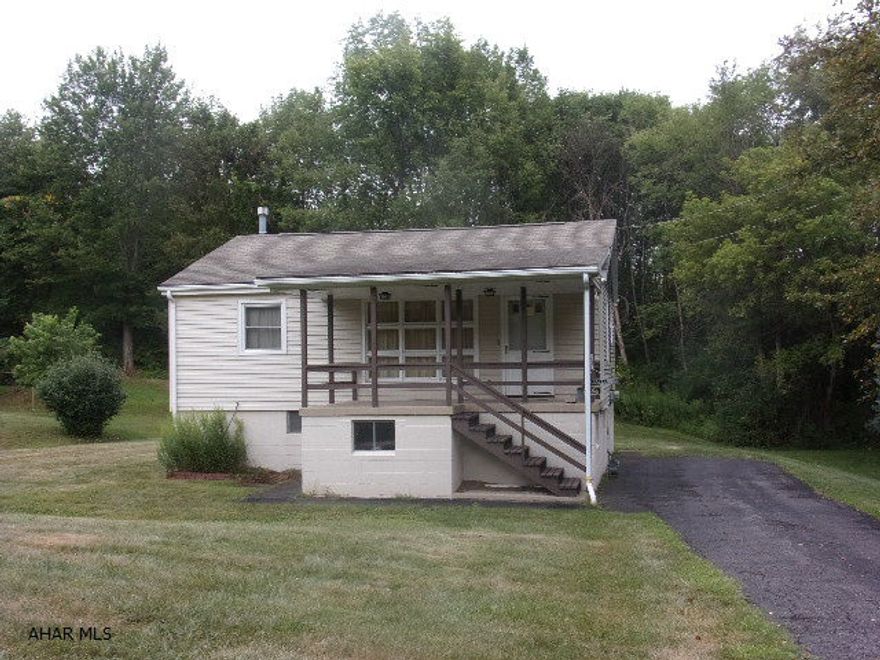 Plenty of potential in this 2BR bungalow in Logan Township,  dead-end street.  Nice yard.  Interior needs cosmetics.