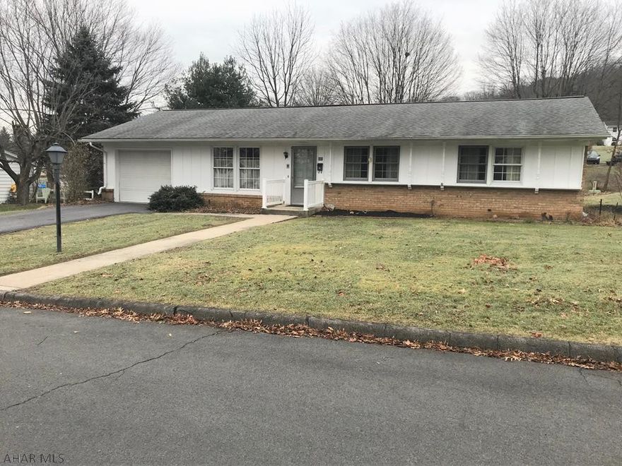 This brick and frame ranch home offers easy one-story living!!  Large living room with double windows, dining room with access to the rear sun porch, kitchen, three bedrooms and one and one half baths.  Lots of natural light in this home, hardwood floors in the bedrooms and a full basement with a finished family room. One-car attached garage, blacktop driveway, level lot and front and rear stoops.  Convenient location to the downtown area, Bedford Elks Country Club and Omni Bedford Springs.