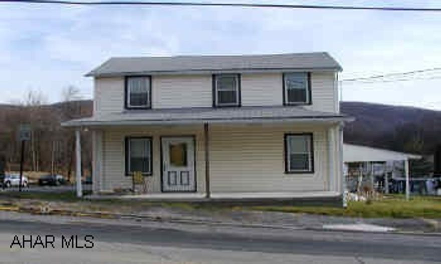 All appliances stay.  Modern kitchen and bath.  Separate workshop and single garage.n