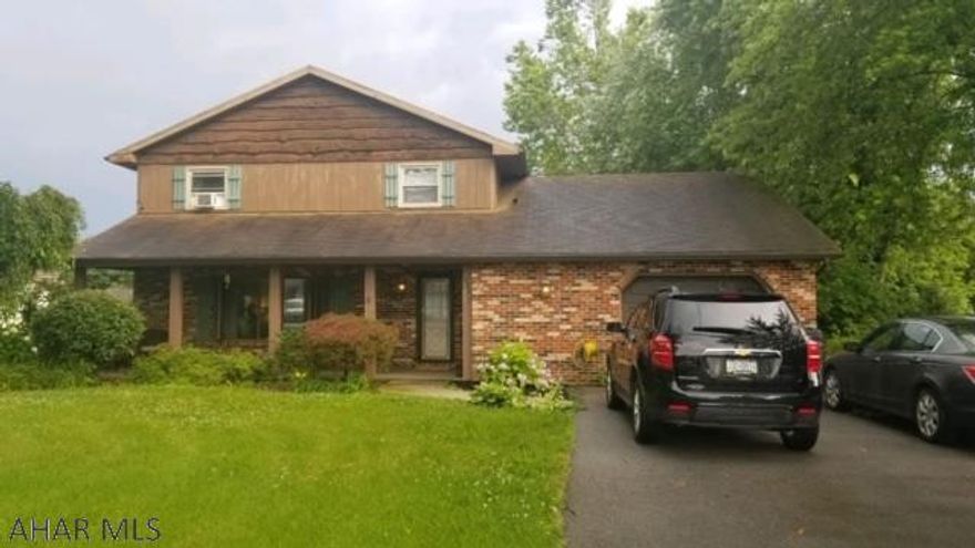 Rolling Hills home on large private flat corner lot. This home features an open kitchen into dining area great entertaining.  Recently updated bathroom and flooring on first floor. Nothing to do but move in !!