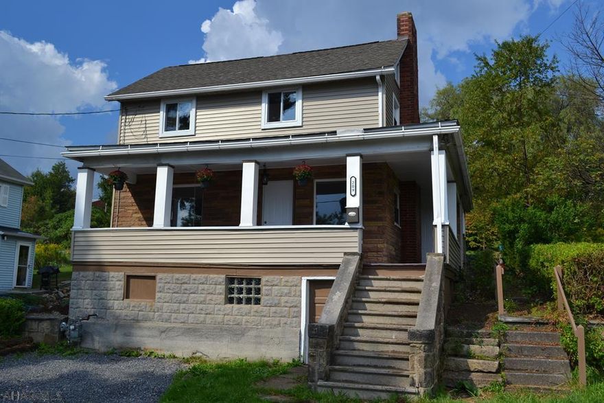 Adorable Gallitzin home that is move in ready! Many updates and Lots of improvements inside and out. 4 BR 2 full Bath with a family and living room! Home already has natural gas and all appliances are included. Off street parking and nice yard. C/A with hot water baseboard heat. Many new windows, siding, windows, lights... Get it before it's gone!