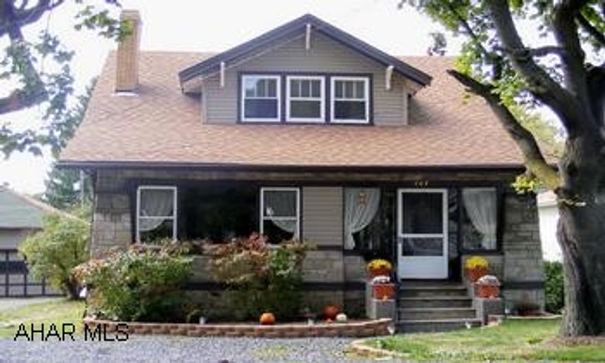 Charming 2 Story Perma Stone Hone - 3 BR, 1.75 Bath - LR Stained Glass Windows & Brick Fireplace - HW Floors - French Doors - Sun Room - 1st Fl. BR & Bath - New Cherry Bath 2nd Fl. With Jet Tub - Heated Basement - 2 Car Garage - Call Bonnie @ 942-2172. Charming 2 Story Perma Stone Home - 3 BR, 1.75 Bath - LR Stained Glass Windows & Brick Fireplace - HW Floors - French Doors - Sun Room - 1st Fl. BR & Bath - New Cherry Bath 2nd Fl. With Jet Tub - 2nd FL BR Walk In Closets -Heated Basement - 2 Car Garage - Chain Link Fence - 2 Yr. Old Roof - New Water Line To Street - All On A 60 x 120 Lot - Call Bonnie @ 942-2172. Or 312-2796.  Sellers Request That Property Remains Active - Home Is Pending - Continue To Show & Take Back Up Offers Until After Inspections & VA Appraisal.