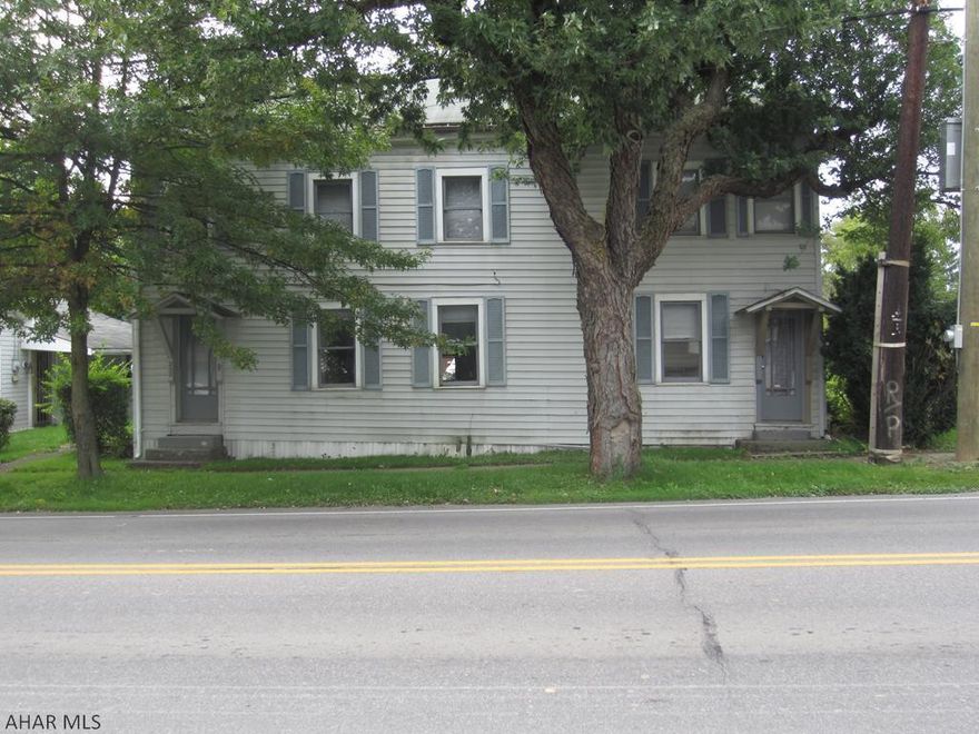 MOTIVATED SELLER  !!!  ...good opportunity for 1st time home buyers or to flip for resale.   The 3 bedroom, 1 bath, 2 story home has nice size rooms and has lots of potential.  With some TLC this home could be turned into an inexpensive  rental property, perhaps a duplex or a nice single family dwelling.  It has a spacious back yard on level lot with off street parking.  A 1 car detached garage sits at rear of lot.  This property will be sold as is.  The seller will entertain any reasonable offer.