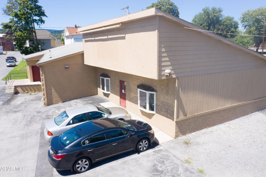 Commercial property along the high traffic 6th Ave of Altoona.  This property has various uses.  Office space with large storage area and dock door.  There is a storefront area in the front of the building, two restrooms, plus plenty of parking. Zoning is Mixed Commercial / Residential.