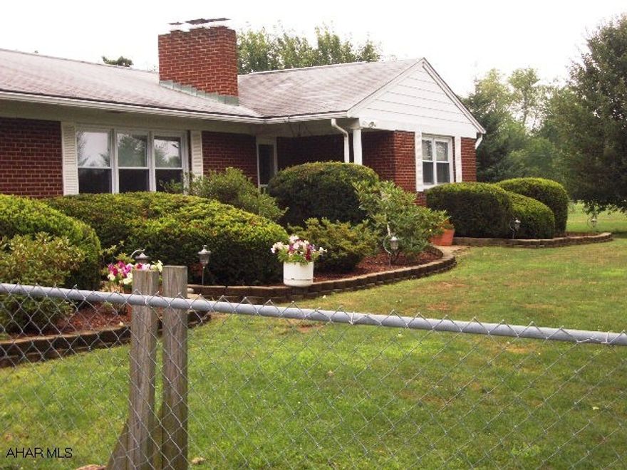 EXCELLENT VALUE-GREAT LOCATION! This sprawling 1950's very well maintained brick ranch is handicap accessible & offers 2064 1st floor square footage w/endless possibilities! Currently has 2 bedrooms, 2 baths BUT an easy convert to 3+ bedrooms and baths! Finished lower level with built in entertainment center, some nwr berber;vinyl replacement&glass block wndws;2furnaces;2WBFPs,2 garages, perennial gardens with landscape lighting;greenhouse! Offers one floor living! Beautifuly hickory cabinets with rolled countertops PLUS MIELE kitchen appliances STAY as do the washer and dryer! Paved drive, central air in main part of house, HSA Warranty provided! $169,000