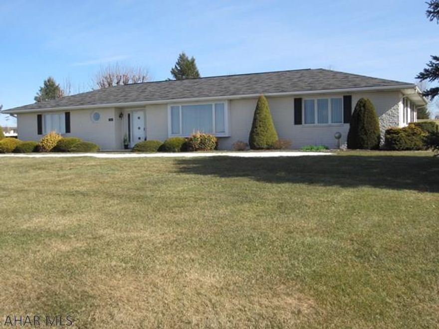 Well maintained fully brick cased ranch.  Setting on 1.01 acres at a beautiful and quiet location at the edge of Martinsburg.  This two bedroom, 2 full baths provides for spacious living with an extra large family room.  Roomy and bright kitchen with eat at bar and appliances are included.  The 2 car attached garage allows for easy access into house and has pull down stairs for attic storage.  Call Listing Agent for your personal showing.