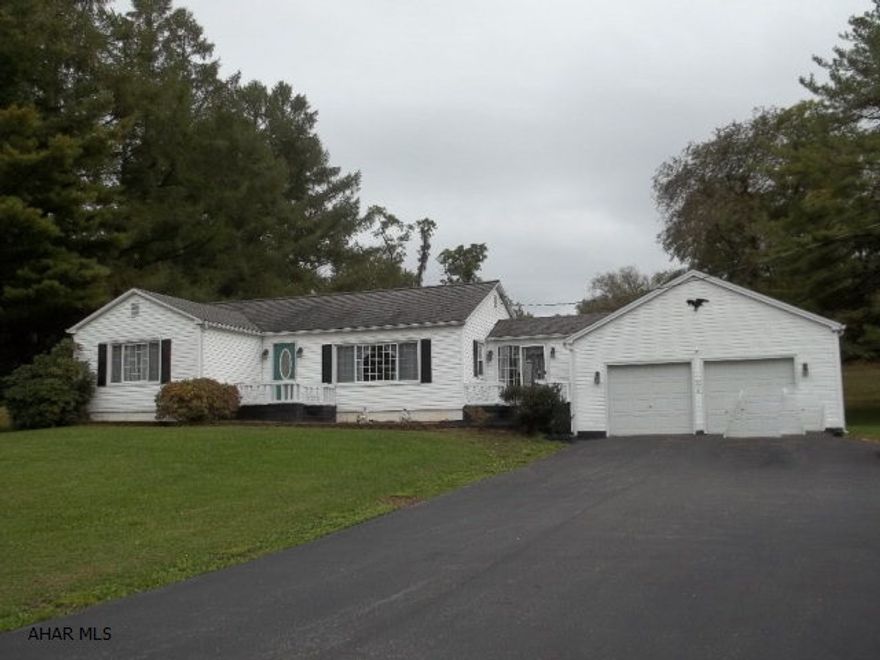 Picture perfect setting on approximately 1.4 acres; amazing views of the golf course.  Three bedrooms, 1.5 baths, hardwood floors, CA, amazing landscaping and views, great layout with a super large family room and amazing stone fireplace conveniently located off the large EIK.  Pictures do not do it justice.  This is a property that must be seen! Conveniently located in Bedford County and the Northern Bedford School District.