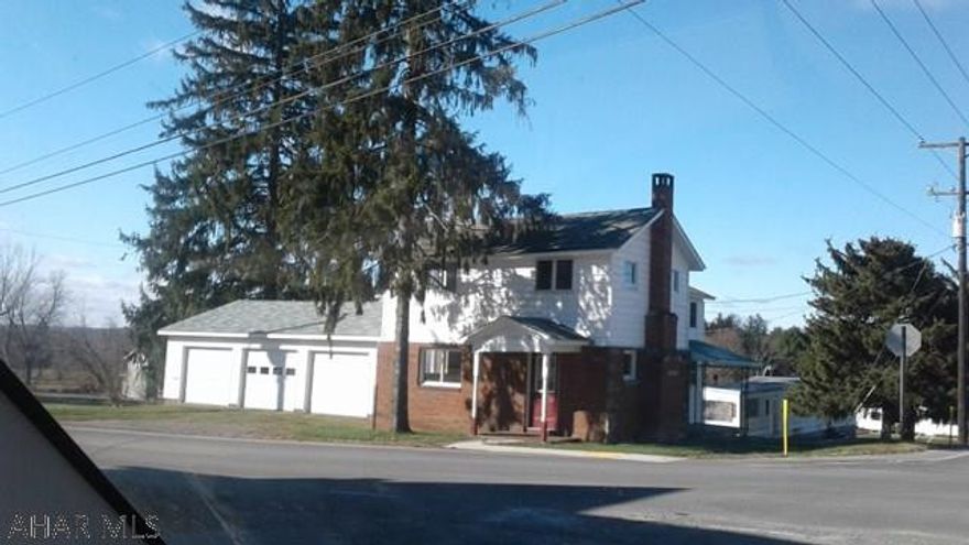 Remodeled two story home including new drywall walls, new floor coverings, new baths ect. Owner is installing a new kitchen, new furnace and hot water heater.  Attached three car garage with new doors. Additional single wide mobile home on site with some work could be rental.  Motivated seller - Reasonable Offers considered!