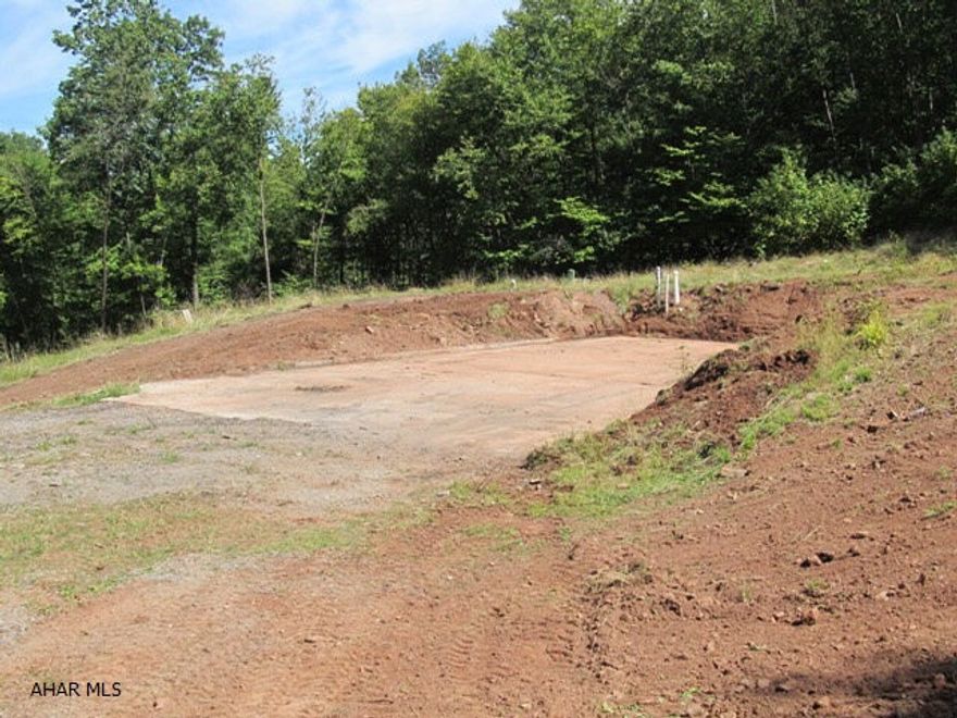Build your Dream Home on nearly 10 acres of private wooded area in the country yet only 5 minutes from town.  Only about 2 miles up kettle rd just past the reservoirs.  ALL UTILITIES INCLUDED!  It already has the septic, well, electric, cable, and a propane line to property.  There already a lot leveled out for your home sitting in the middle of trees and wildlife!