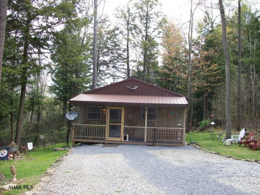 Cozy secluded one story house in immaculate condition, new metal roof, thermal windows, fenced yard, enclosed front and back porches, all appliances, move in condition, all the amenities of Glendale Yearound.