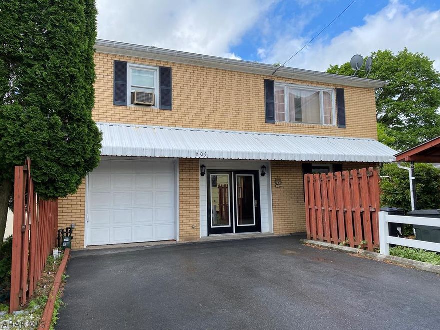 All brick, raised ranch in Tyrone Borough with 2 bedrooms, 1-1/2 baths, hardwood floors, new water heater.  Main floor features a large rec room w/wet bar and 1/2 bath.  Large driveway and 1-car integral garage for plenty of off street parking.