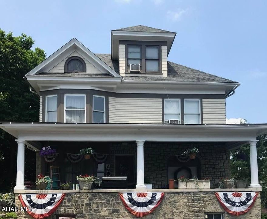 Want a home for Christmas with never ending Character? From the Harwood floors to the crown modeling, pocket doors, and stone exterior this home is truly special. Featuring 5 bedrooms 1.5 bathrooms with bonus rooms. No need to worry about parking with lots of Off-Street parking in rear with a large, detached garage.