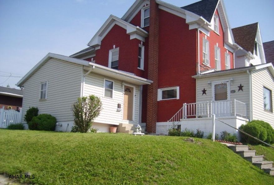 Tremendous home at a great value.  This is a must see.  Large rooms including a first floor master suite with master bath.  This home comes with a huge workshop/garage with endless possibilities.  This house is not going to last long.  Huge lot and great area.  Schedule your showing today!