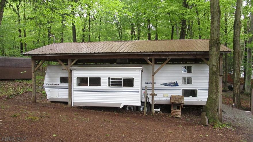 This property is all about the location. Perched on the back end of Saquaro Circle you have privacy looking out into the woods. The spacious deck and outdoor area afford you all the things that camping is about: enjoying the outdoors. Inside there is room for all with two bedrooms. The second bedroom with triple bunks also gives the young ones a table to play games or eat. Situated in the gated recreational community of Glendale Yearound offers you the amenities of the development - swimming pool, tennis/basketball/volleyball, playgrounds, dog park, planned activities, etc. along with what Prince Gallitzin State Park / Glendale Lake have to offer: boating, fishing, swimming. Rock Run ATV Park is only six miles away.