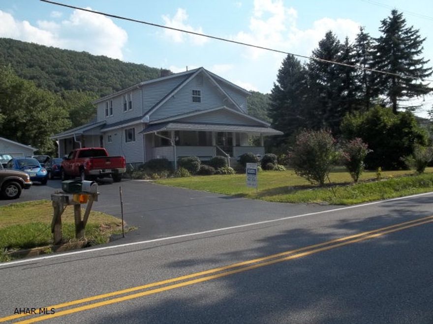 Newly sided home with up to six bedrooms.  Home includes an above ground pool with pavillion style decking.Home was previously duplexed and could be easily returned to a duplex. Small barn on property, and with almost 3 flat acres,could support a horse or two.  Large renovated kitchen with hickory cabinets and tons of storage.  It is newly sided with newer furnace and roof.....did I mention central air and heat pump.Definately worth a look.