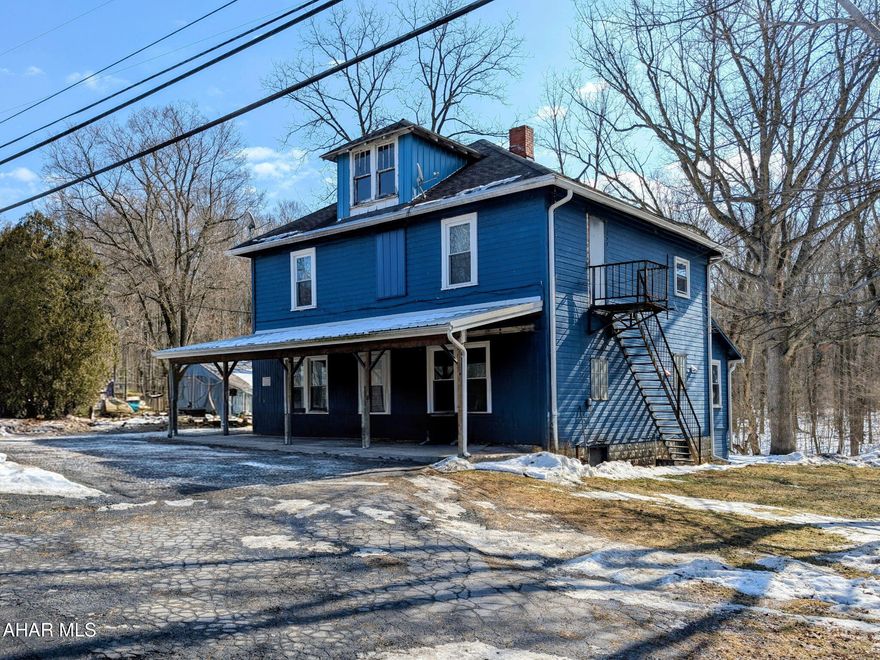 What an extraordinary investment opportunity in the heart of Bedford County, Pennsylvania. This 12.055-acre property in rural Schellsburg offers a unique blend of rustic charm and untapped potential. Featuring a classic fixer-upper farmhouse alongside six charming cabins, this parcel is brimming with possibilities for the savvy investor or creative entrepreneur.

The main house awaits your vision to transform it into either a primary residence or an inviting retreat. Each cabin, nestled amidst Bedford County's countryside, provides potential for a serene guest village perfect for rural retreats or vacation rentals.

The setting lays the groundwork for creating memorable experiences and potential for inspiring spaces. Whether developing a vacation destination that capitalizes on outdoor pursuits like nearby hiking and fishing, or crafting unique lifestyle offerings - this property's versatility ensures endless opportunities.

Conveniently located within 15 minutes of historic downtown Bedford, Flight 93 Memorial and within 5 minutes of Shawnee State Park, this property offers vibrant community amenities while offering a rural setting of farmland and quietness.  Schedule your own tour today!