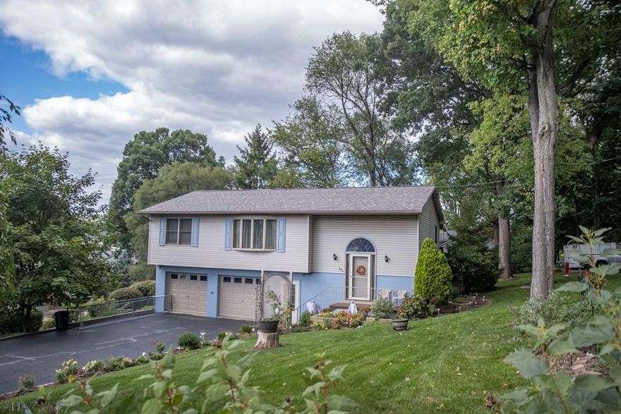 NEW PRICE! You will love this beautiful custom designed home on a large corner lot in Altoona! This property has it all! The home itself is a unique multi-level design with a spacious addition on the back featuring walls of windows and a spiral staircase that connects to a media room/bar area on the first floor. This space is currently used as a recreation room with a hot tub and exercise equipment. But, it can easily be converted into a two floor master suite! The home also offers two more bedrooms, 2 baths, a two car garage, a bonus family room and a covered patio with an enclosed porch/sunroom above. This is one property you have to see to appreciate!