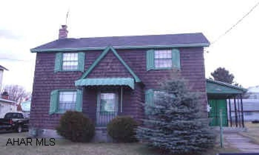 TWO STORY FRAME, TWO BEDROOM HOME HAS  BEAUTIFUL CHARACTER, HARDWOOD FLOORS, VERY QUAINT INSIDE