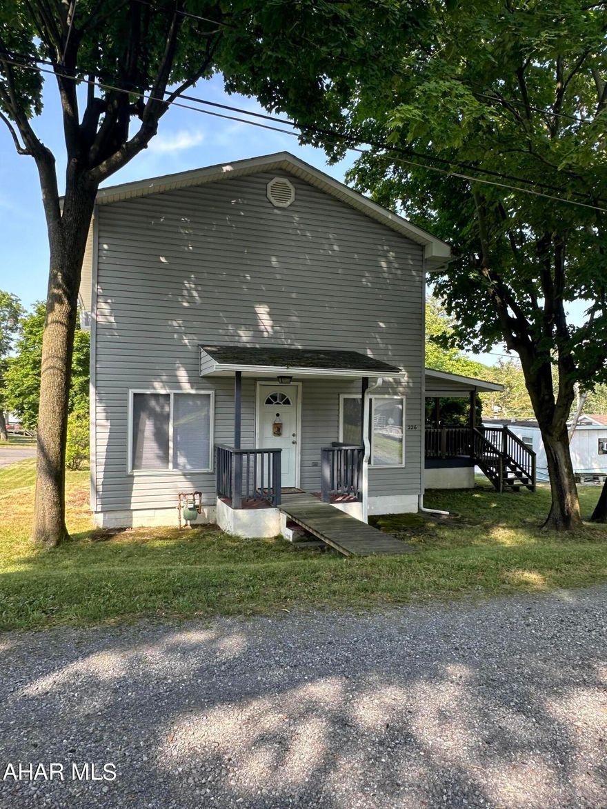 Immaculate well maintained 2 story located in the Lakemont area of Altoona. Spacious kitchen, living room, sunroom and half bath on the first floor. Three bedrooms (one is used as a laundry room presently but could be converted back) and a large bath on the second floor. Great covered deck to set on and enjoy the evenings. A one car integral garage and carport with a paved drive for parking. This property has been very well maintained.