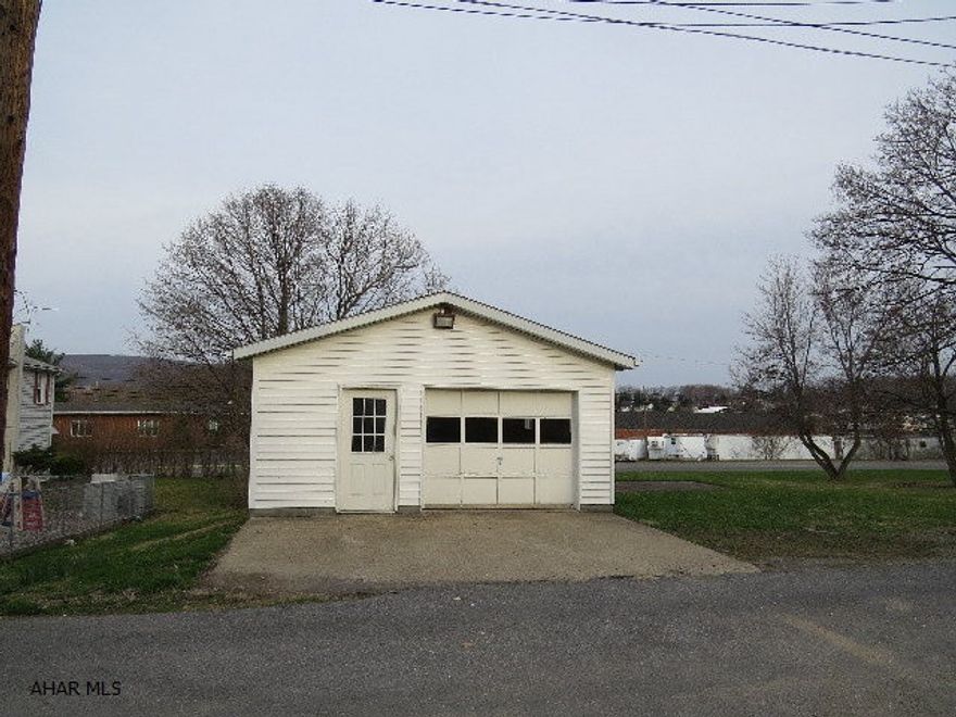 Garage has new motor, springs, external keypad, and two openers.  Located on a 40x120 lot.