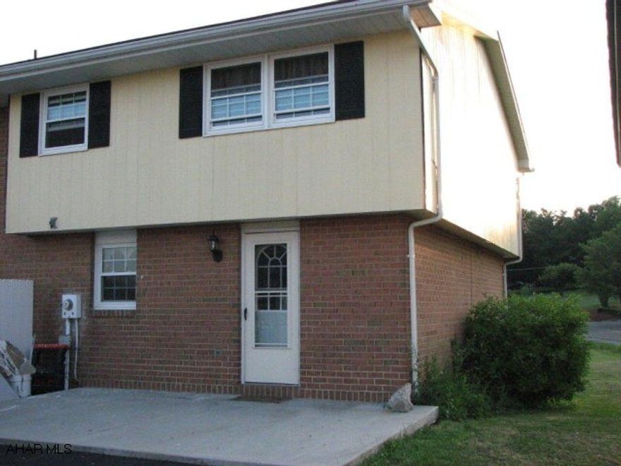 NO ASSOCIATION FEE!!!! Completely updated townhouse with maple cabinets, stainless steel appliances, newer carpet, windows, trim, doors, paint, and pergo flooring.  Oak staircase, ceramic tile bathrooms and oak vanity.  Super nice.  Great location for kids to ride bikes.