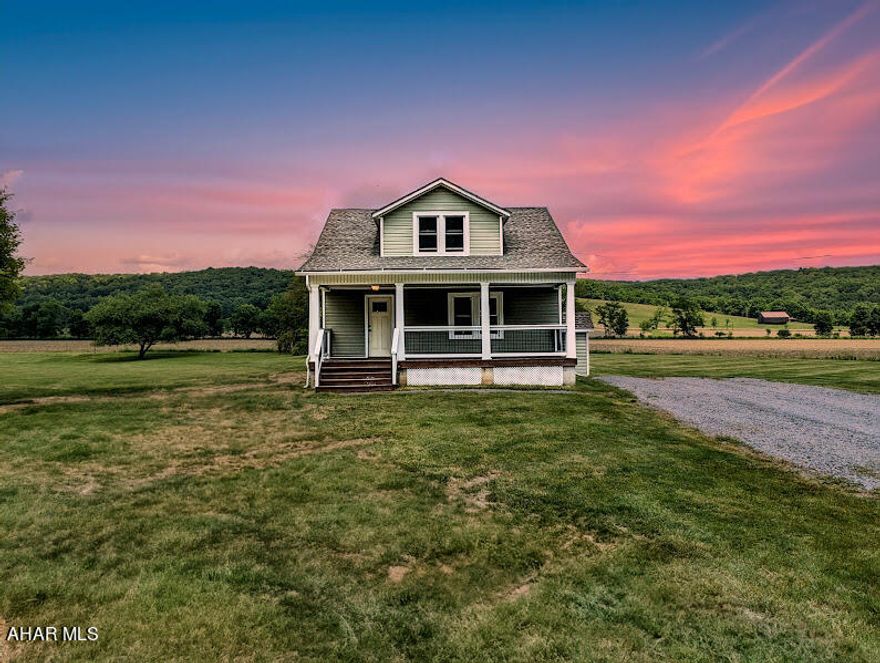 Step inside this inviting and charming home tucked away in Bedford County.   A lot of love has gone into this 3 bedroom, 1 bath home which sits on approximately 1.11 acres +/- in the Chestnut Ridge School District.  Walk inside and you will notice a nice, flowing layout that will guide you into a cozy living room with plenty of space for relaxing at the end of a long day.  From the living room walk into the dining room which flows nicely into the remodeled kitchen.   Laundry is on the first floor and has been nicely updated as well. Upstairs you will enjoy 3 bedrooms with spacious closets  and a full bathroom.  The outside of this home has also had a lot of care with newer siding in the last several years and a gorgeous front and back porch that are great entertaining areas.  Enjoy a large yard and the peacefulness of rural Bedford County.   Check it out for yourself.  Call to schedule your own personal tour.